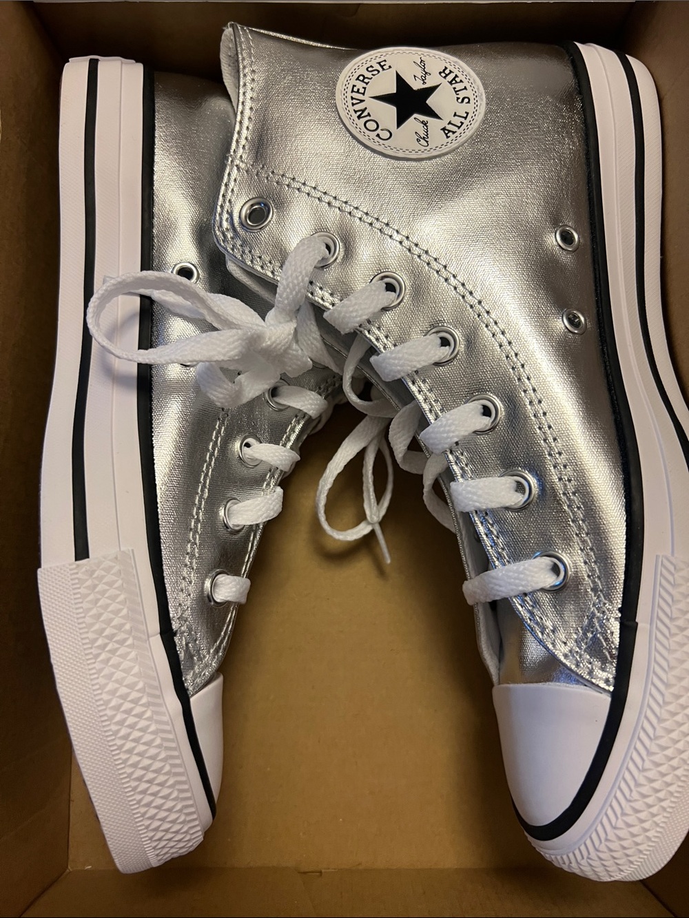 Silver metallic Chuck Taylor All-Star high tops, brand new W8/M6